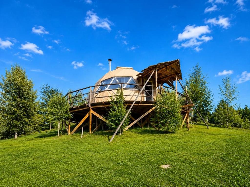 A dome on the green hillside