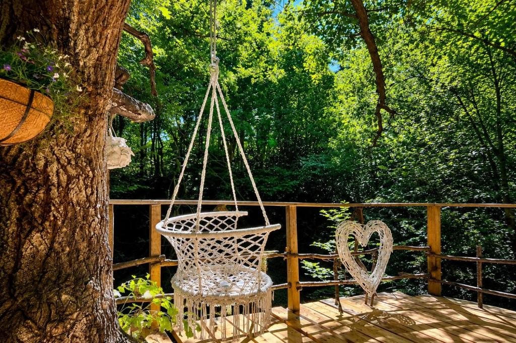 Grounds & Nature — A swing on the deck